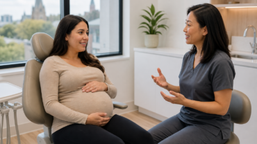 Pregnant patient discussing oral health with a general dentist in Ottawa